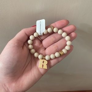 Anthro ‘R’ stretch bracelet